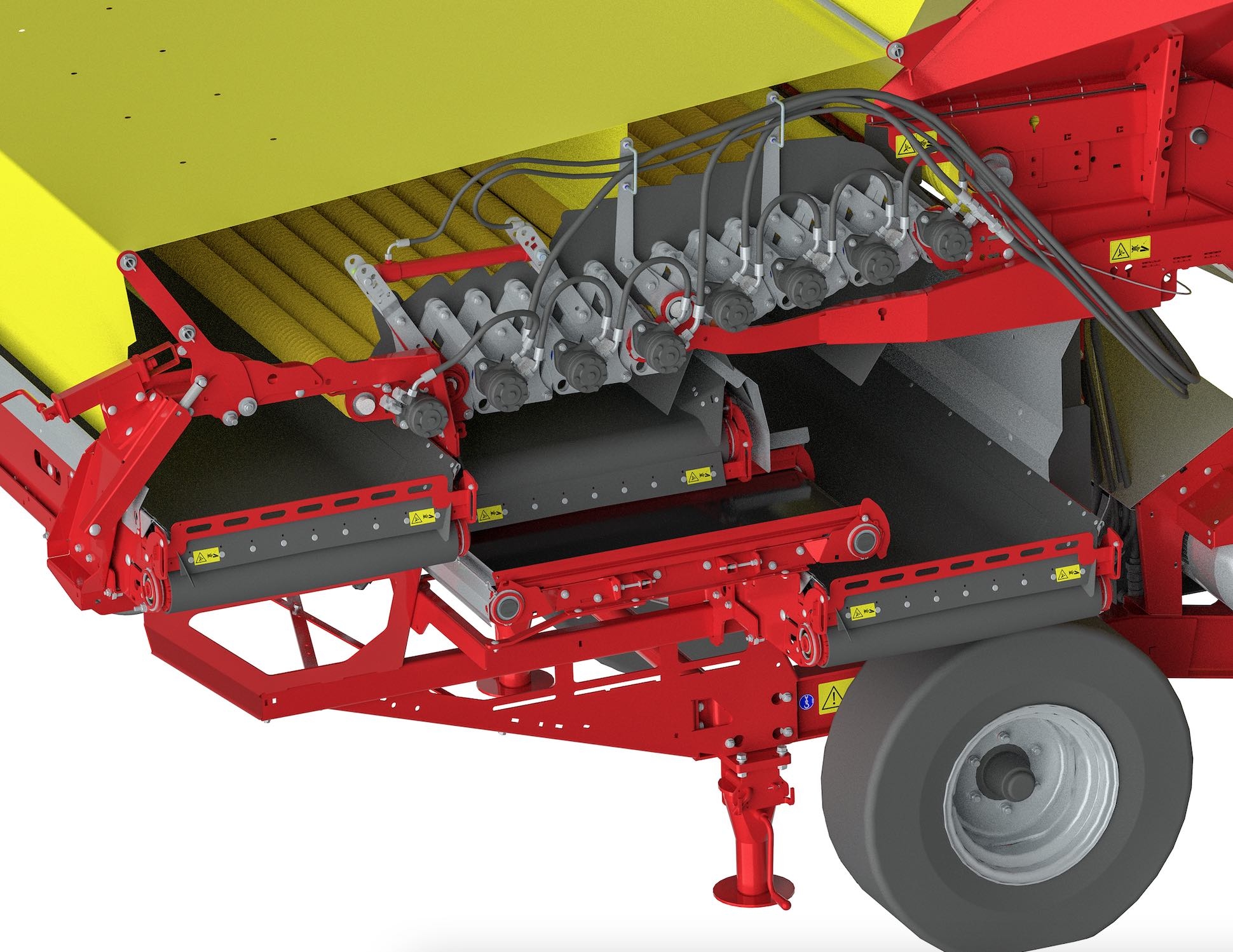 Tapis de sortie collecteur pour la liaison entre la bande de sortie produit pré-calibré et la bande de sortie terre
